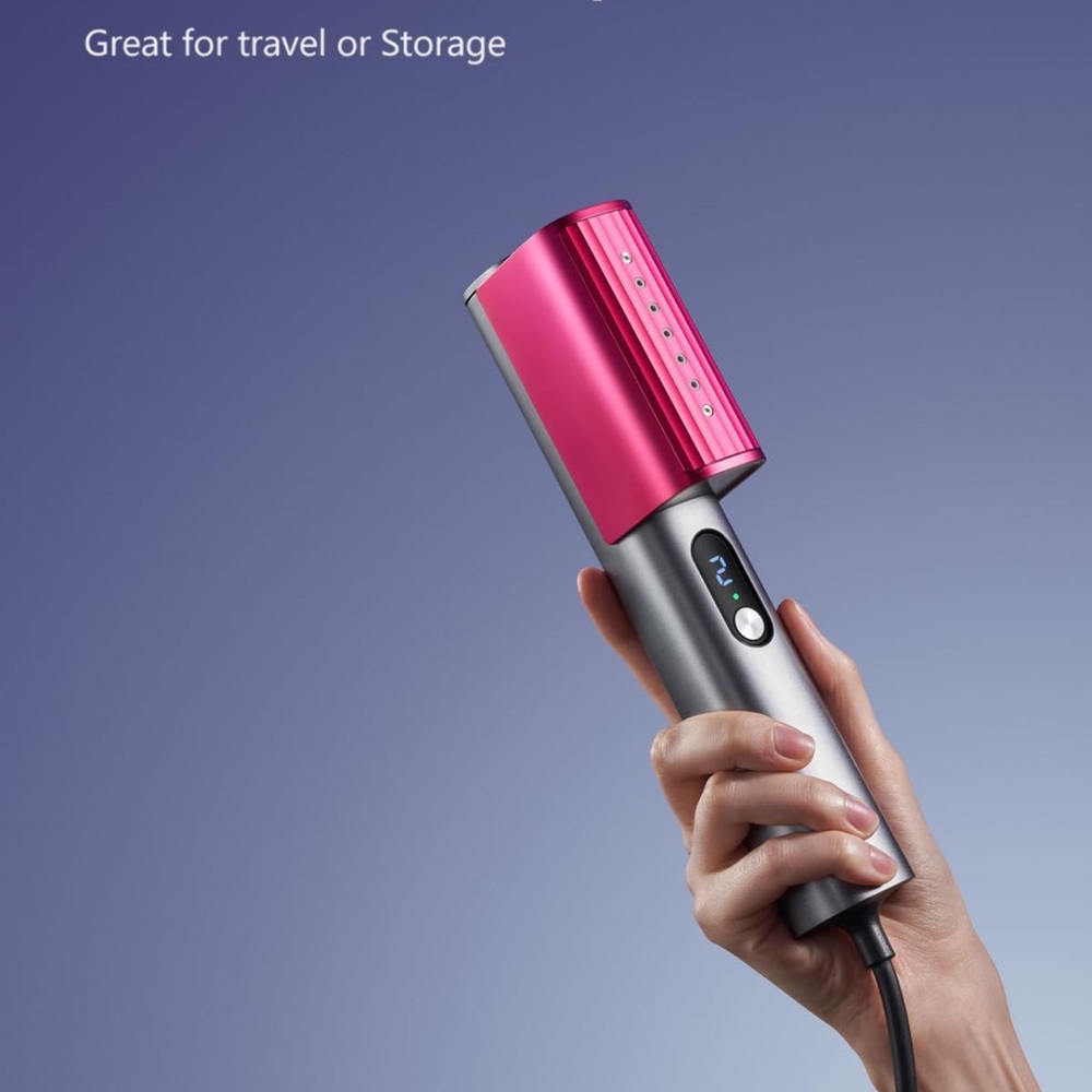 Pink and Silver clothes steamer/iron
